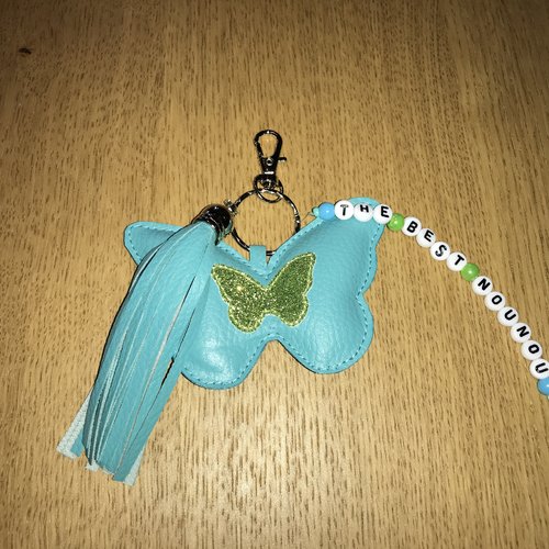 Porte-clés nounou papillon turquoise