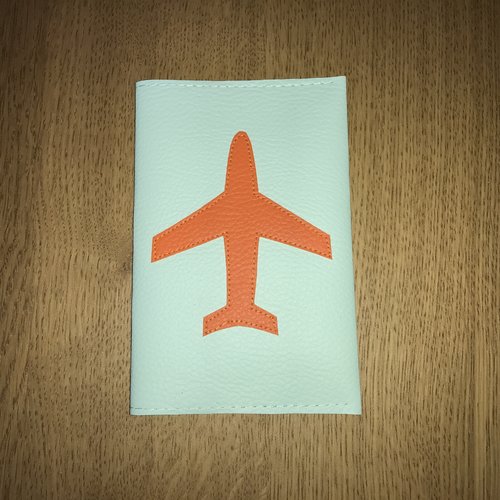 Protège passeport avion orange/vert aqua