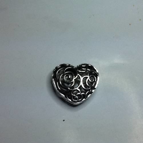 Cœur filigrane en métal argenté 