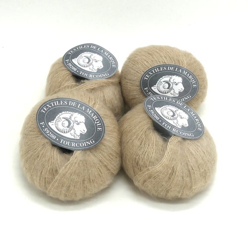 4 pelotes textiles de la marque steppe beige c 56