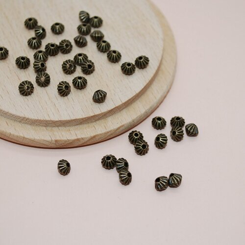 Lot de 10 perles séparateurs toupies bronze pour création de bijoux, perles 3mm
