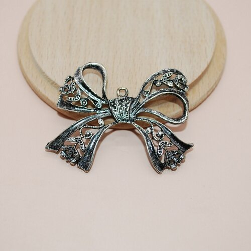 Pendentif breloque noeud papillon argent used 48mm pour création de bijoux, breloque noeud papillon argent