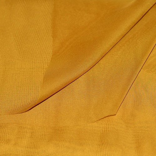 Tissu mousseline polyester jaune doré, coupe par 50 cms