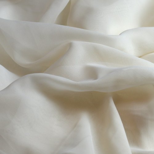 Tissu mousseline polyester ivoire, coupe par 50 cms