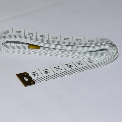 Mètre ruban de couturière - blanc - 150 cms - plastique - qualité extra.