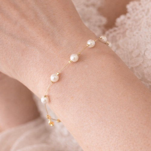 Bracelet mariée perles swarovski nacrées doré ajustable- subtile