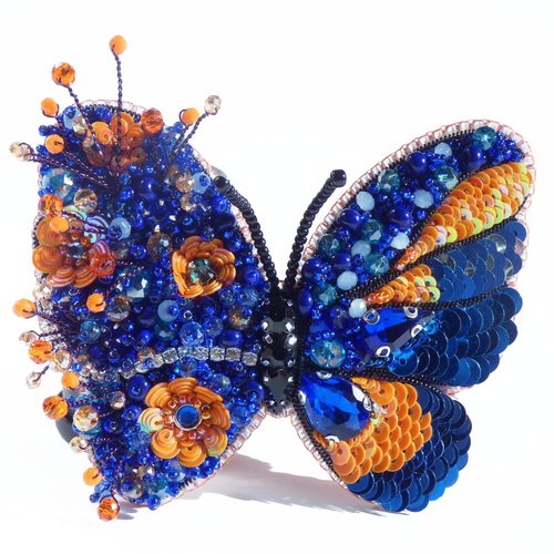 Broche brodée "papillon bleu orange"