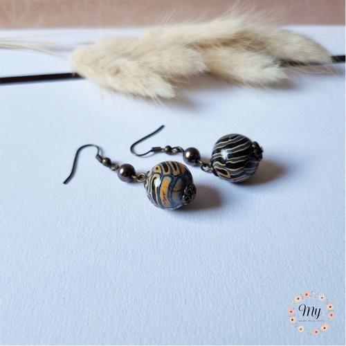 Boucles d'oreilles pendantes noir orange