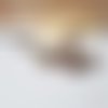 Bijou de sac 5 perles chocolat plume et feuille