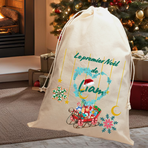 Pochon de noël personnalisable en coton avec cordon de serrage "le premier noël de"– parfait pour glisser les cadeaux des enfants.