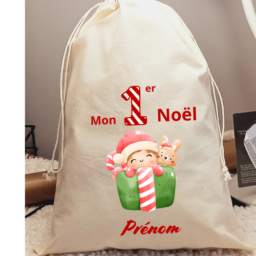 Pochon de noël personnalisable en coton avec cordon de serrage "mon premier noël"– parfait pour glisser les cadeaux des enfants.