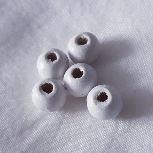 Perle palet plat noir et blanc, synthétique. 30*3 mm, enfilage 0,8 mm.