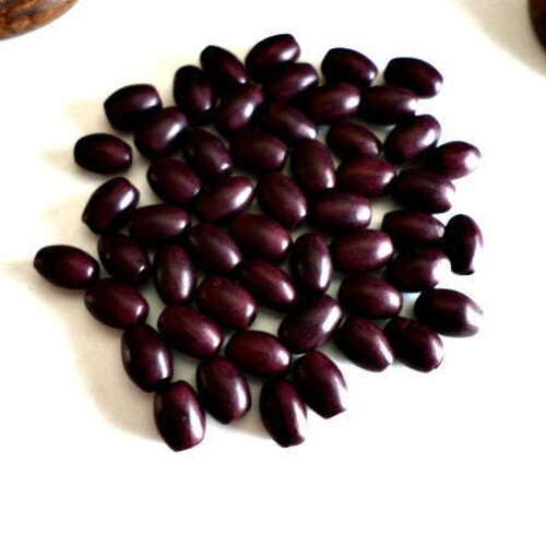 50 perles anciennes françaises ovales en bois peint forme grain de riz 6 x 8 mm