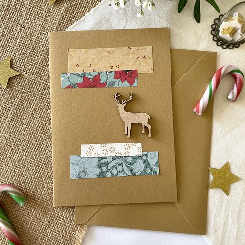 Carte de voeux renne de noël en bois et papiers festifs