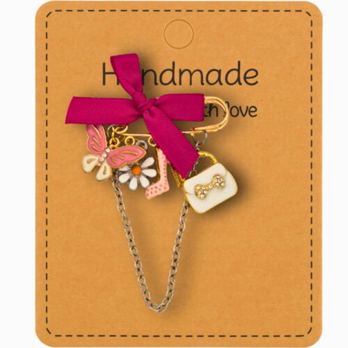 Broche rose &quot;éclat de tendresse&quot; – bijou poétique fait main – cadeau féminin avec ruban et breloques dorées