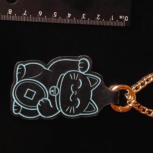 Bijou de sac (bag charm) cuir tannage végétal | porte-clés historique engravé doré | cadeau féministe artisanal fait main france