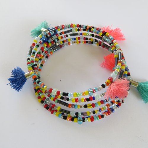 Bracelet fil mémoire , perles de rocailles multicolores et petits pompons;