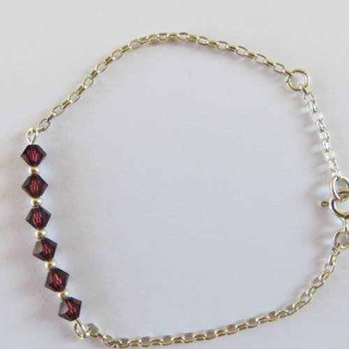 Bracelet argent 925 et  perles toupies  cristal swaroski.