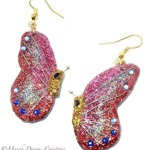 Boucles d'oreilles  ailes de papillon féériques roses, rouges et  dorées avec des strass en  cristal