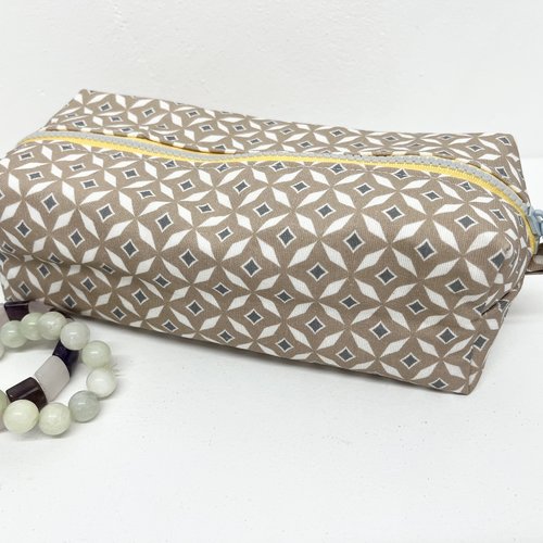 Trousse maquillage enduit