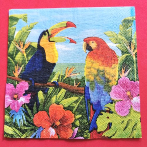 Serviette papier/napkin:  "perroquet rouge,jaune, bleu et toucan, fleurs d’hibiscus, feuille de palmier, fleurs perroquet"