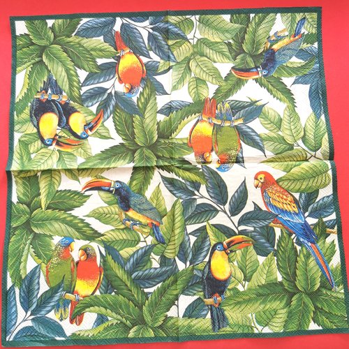 Serviette papier/napkin:  "toucans et perroquets rouge, bleu jaune,, vert dans les arbres"