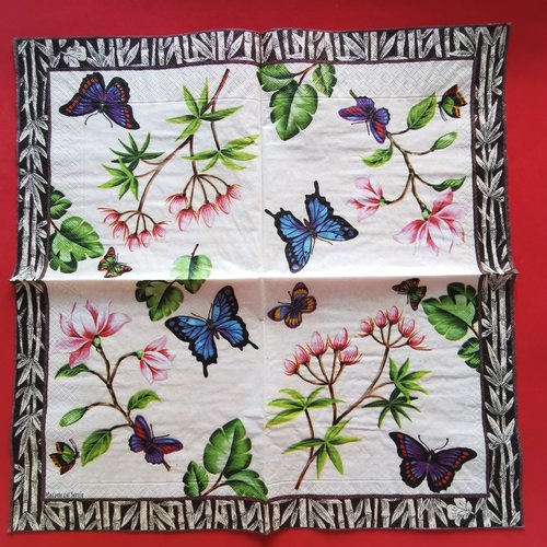 Serviette papier/napkin : "papillons, fleurs de magnolia, feuille de philodendron"
