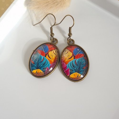 Boucles d'oreilles pendante ovale métal bronze cabochon verre feuille tropical