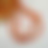 Fil de 140 perles ronde de verre craquelé fabrication bijoux 6 mm orange cristal