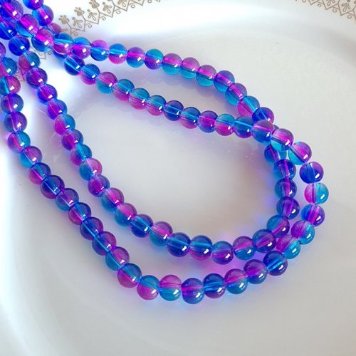Fil de 130 perles de verre transparent deux couleurs 6 mm rose bleu