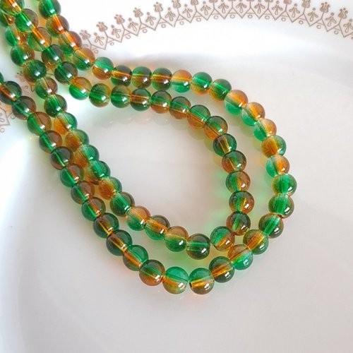 Fil de 130 perles de verre transparent deux couleurs 6 mm marron vert