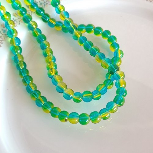 Fil de 130 perles de verre transparent deux couleurs 6 mm bleu vert