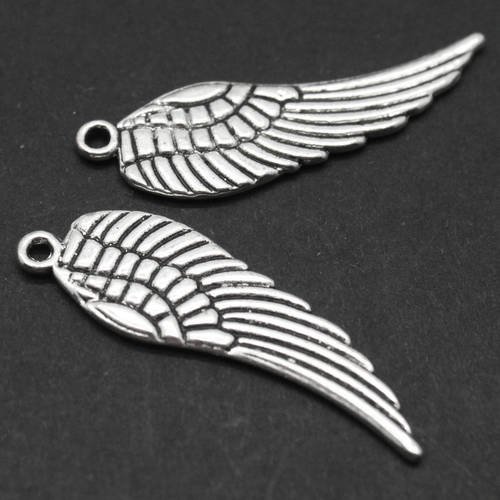 Lot de 4 breloques "ailes" en métal argenté effet vieil argent 