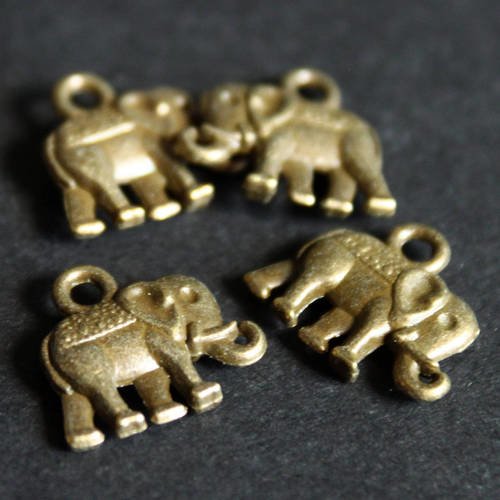 Lot de 4  petites breloques "éléphant" en métal bronze 