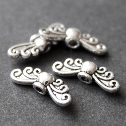 Lot de 6 petites perles intercalaires "ailes" en métal argenté aspect vieil argent 