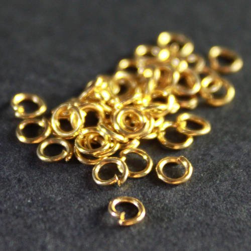 Lot de 50 anneaux 3mm x 0,6 mm en métal doré ---