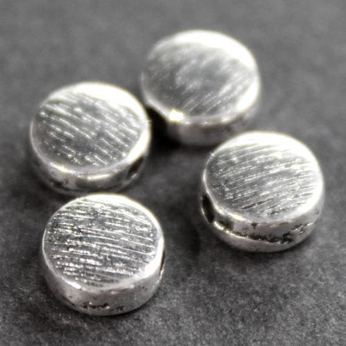 8 jolies perles palets rondes 6 mm en métal argenté strié 