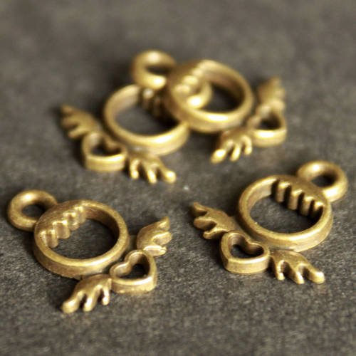 10 mini breloques " coeur ailé " en métal bronze 