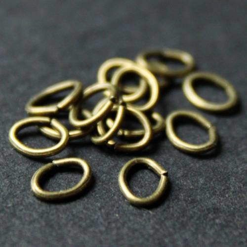 Lot de 50 anneaux  ovales  5 mm x 4 mm en métal bronze