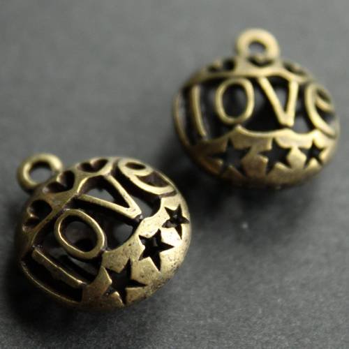 Jolie breloque pendentif "love" en métal bronze 