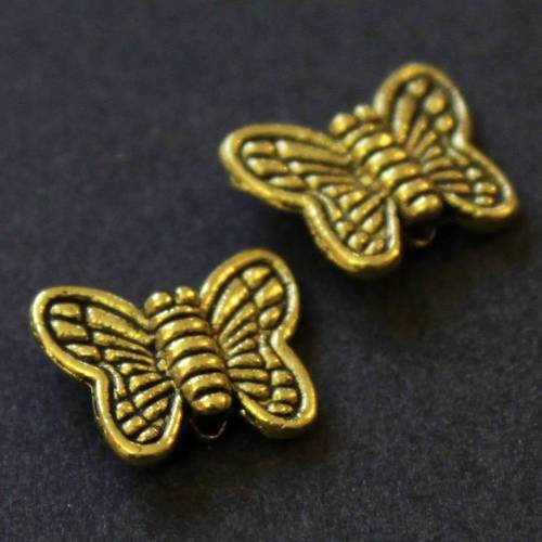Lot de 4 perles intercalaires papillon en métal doré aspect vieil or 