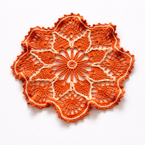 Napperon au croche tflamme florale