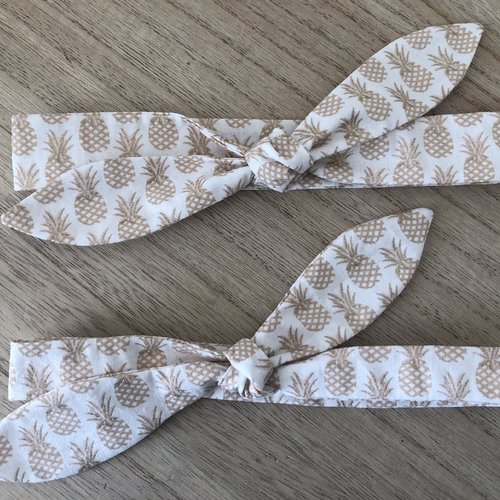Bandeau en coton motifs ananas doré sur fond blanc pour bébé