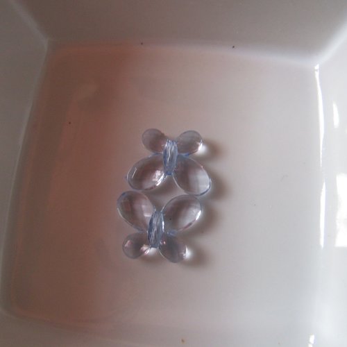 1 perle papillon 18x14mm en plastique transparent