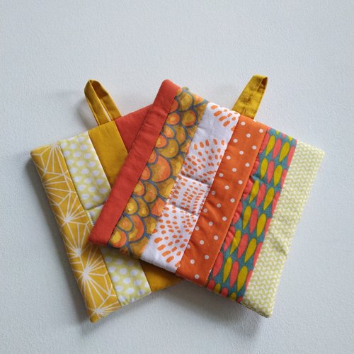 Maniques tons jaunes et oranges