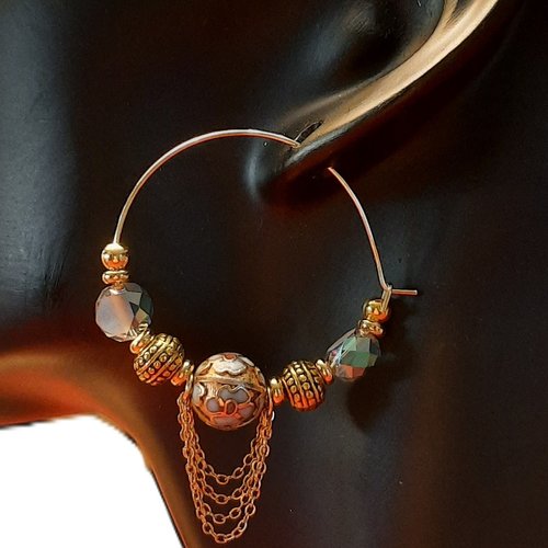 Élégantes boucles d'oreilles dorées et bleues