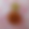 1 gros bouton plastique de couleur orange - 30 x 4.5 mm - 2543155