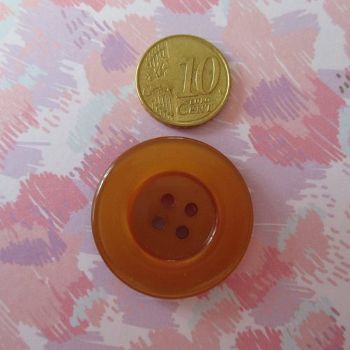 1 gros bouton plastique de couleur orange - 30 x 4.5 mm - 2543155