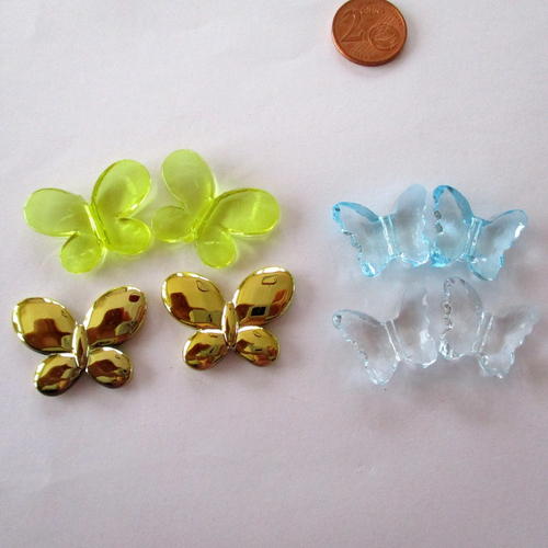 8 perles plastiques en forme papillon - 3502611