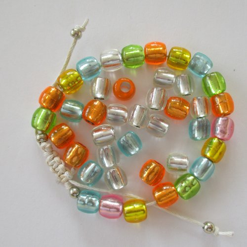 35 perles plastique ovales métallisé multicolores - 3543458